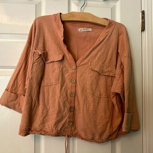 Free to be you! We the Free slouchy top in an earthy peachy tone.